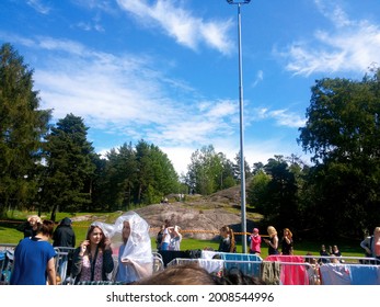 Helsinki, Finland - June 27, 2015: Before The One Direction - On The Road Again Tour 2015 Concert In Olympiastadion; Merch And Fans Near The Stadium; One Direction Or 1D Are An English-Irish Boy Band