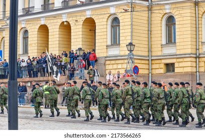 HELSINKI, FINLAND - JUNE 4, 2022:
Defense Forces Flag Day in Helsinki. The viewing of the troops was held at Senatintor in the heart of Helsinki. People follow the march on the steps of the building.
