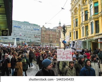 Helsinki, Finland - March 22, 2003: Anti-war Protesters March Through Downtown Helsinki To Protest The Impending United States Of America Invasion Of Iraq. 