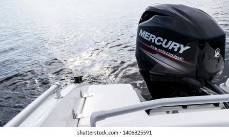 Helsinki, Finland, May 20, 2019: Modern New Fishing Sport Boat With A Brand New Mercury FourStroke Outboard Engine On The Lake.