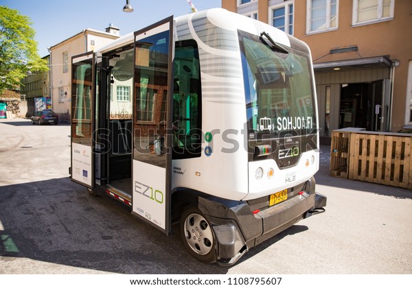 HELSINKI,\
FINLAND - MAY 25, 2018: Automated remotely operated bus test in\
Helsinki. Unmanned public transport on\
street.