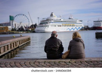 Helsinki Finland Oct.1 2018 Couple Sit Together Under The Sun In A Fair Weather