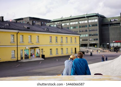 Helsinki Finland Oct.1 2018 Couple Sit Together Under The Sun In A Fair Weather