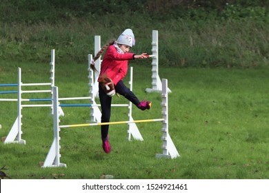 Helsinki, Finland - October 5 2019: a jumping course for hobby horses was available for everyone during the week-end. The participants brought their own hobby horses and tested the obstacles.