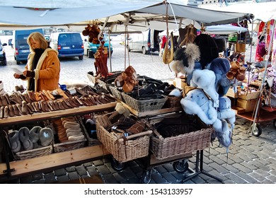 Helsinki Street Market Vendors Selling Knitted Goods And Fur. Helsinki, Finland, October 27, 2012.