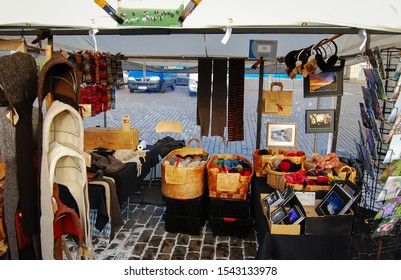 Helsinki Street Market Vendors Selling Knitted Goods And Fur. Helsinki, Finland, October 27, 2012.