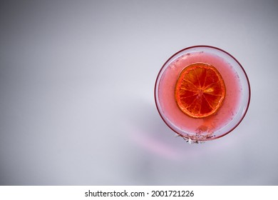hemingway daiquiri cocktail drink with grapefruit in glass on white background