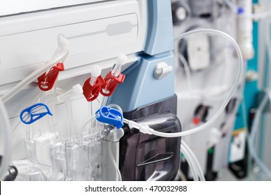 Hemodialysis bloodline tubes connected to hemodialysis machine. Health care, blood purification, kidney failure, transplantation, medical equipment concept.  