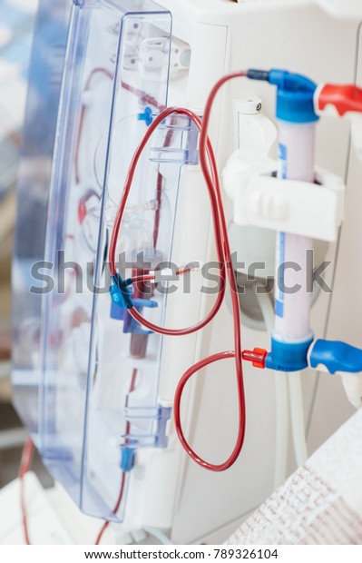 Hemodialysis machines with\
tubing.