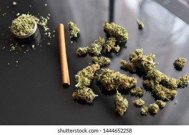 Hemp Legalisation. Fresh Marihuana. CBD And THC On Buds In Cannabis. Backgroun For Copy Space. Hemp Wraps For Blunt. Cannabis Buds On Black Background.