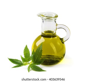 Hemp oil n a glass jar isolated on a white background