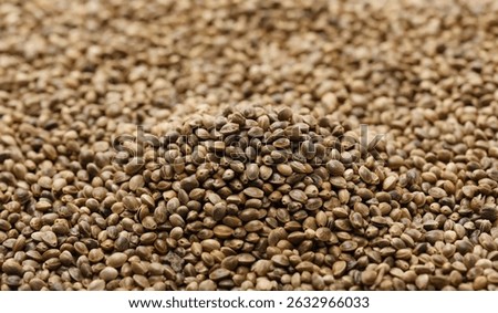 Hemp seeds background and texture, macro	