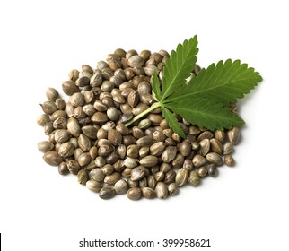 Hemp Seeds With A Green Leaf On A White Background