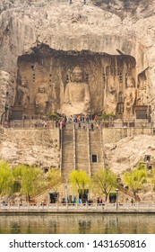 Henan, China- MARCH 19, 2014: Chinese Buddhist art  were carved into caves excavated from the limestone cliffs of the Xiangshan and Longmenshan mountains