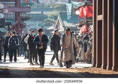 Hengdian, Dongyang, Zhejiang, China - December 26 2021: Film Crew And Actors Preparing For The Next Scene.