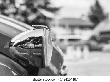 Hengelo / Netherland - June 11 2019 : Black And White Photo Of The Headlight Of A Citroën 2cv