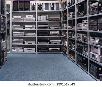 Hengelo / Netherlands - April 26 2019 : Aisle In A Second Hand Store With All Kinds Of Electronics From Different Brands