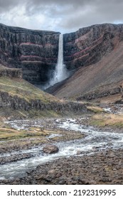 Hengifoss Waterfall (128 Meters), East Iceland. Basalt Is Layered With Clay.