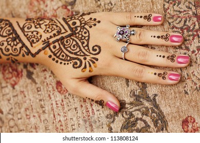Henna Art On Woman's Hand