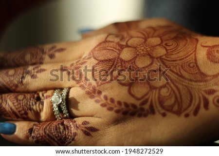 Henna Body Art- Artistic photographic impressions. Hand, foot and arm designs 