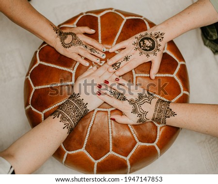 Henna Mehndi Party Designs on ladies hands and arms. Arabic night one night in Morocco henna function