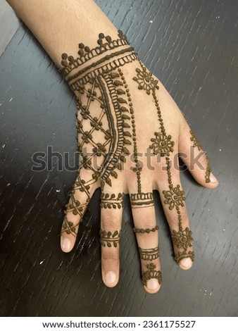 Henna tattoo design on hands 