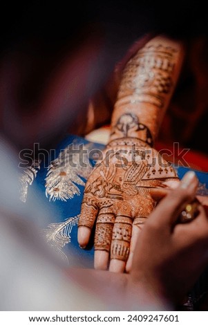 henna tattoo on women hands. Mehndi is traditional Indian decorative art. Close-up