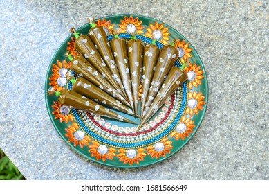 Henna/Mehendi Cone Placed In Decorated Plate In India. Mehndi Cone In Wedding / Marriage