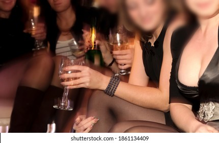 Hen-party. Group Of Girlfriends. Female Sit At The Car And Drink Champagne Together. Bachelorette Party. No Faces.