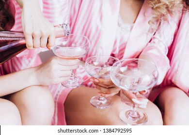 Hen-party. Party For Girls. Girlfriends Drink Pink Champagne Before The Wedding Ceremony In Pink Pajamas. Last Night Before Marriage.