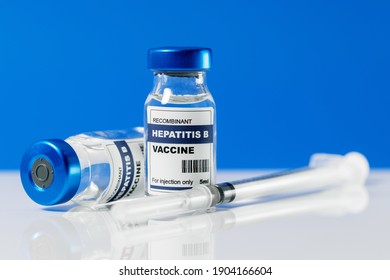 hepatitis b virus vaccine vials and syringe