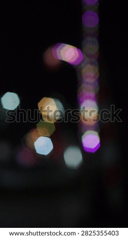 Heptagonal Bokeh Lights on Dark Background
