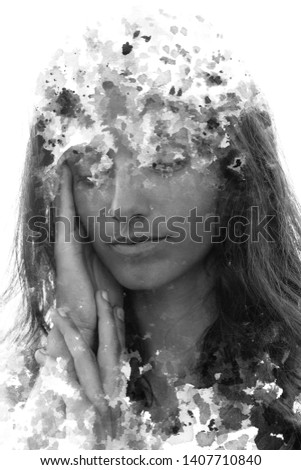 Her face dissolves into the ink as she gently caresses herself