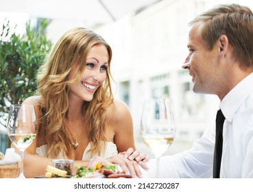 Her First Date After Plastic Surgery. A Woman With Cosmetic Enhancements Admiring Her Boyfriend In A Restaurant.