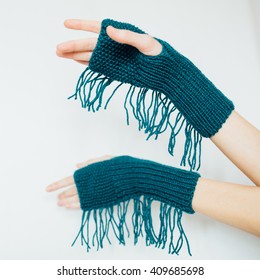 Her hands in gloves. Mittens with a fringe. Tassel. Warm and Cozy! Winter Fingerless Gloves, Crochet Wrists/Arm Warmers