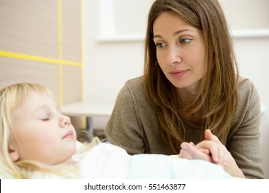 Her little precious. Shot of a mother watching her sleeping daughter at the hospital room comfort wellbeing healthcare medical childhood insurance rehabilitation ward love family coziness concept