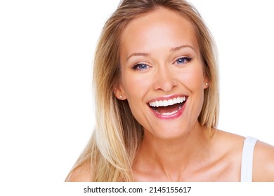 Her Positive Outlook Is So Attractive. A Gorgeous Young Woman Laughing While Isolated On White.