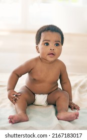 And So Her Story Begins. Shot Of An Adorable Baby Girl At Home.