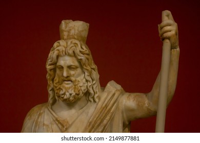 Heraklion, Greece - July, 03, 2021: Head of the god Pluto from the group statue of Pluto and Persephone. Pluto-Sarapis has the modius on his head, a utensil used for the measurement of grain