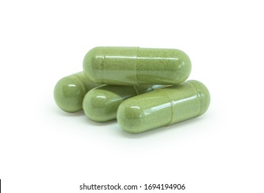 Herb capsule,Herbal medicine,Andrographis paniculata herbal antipyretic capsules isolated on white with clipping path.