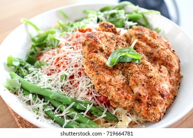 Herb Chicken Escalope With Tomato Sauce And Tagliatelle