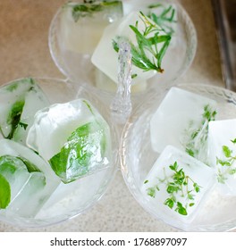 herb infused ice cubes for fun summer beverages and beverage stations. Great for parties. - Powered by Shutterstock