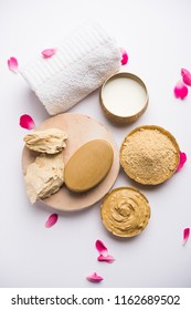 Herbal Or Ayurvedic Face Pack Using Multani Mitti, Milk Etc Placed With Soap, Towel. Selective Focus