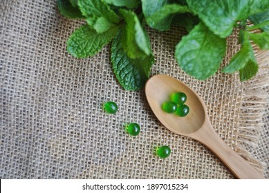 Herbal Medicine From India Pearl Is Small, Clear Green Tablets With Mint Extract Properties As A Digestive Aid For People Who Eat A Lot Or Stomach Pain And Gas In The Stomach.