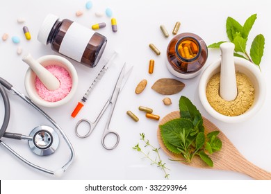 Herbal medicine VS Chemical medicine the alternative healthy care on white background.