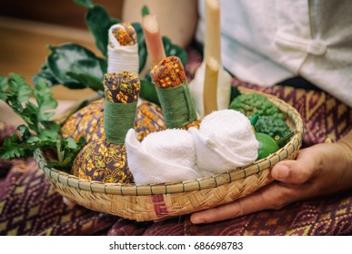 Herbal spa balls and Thai herbs for treatment or massage in Thai spa 