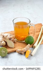 Herbal Spices Drink Consist Of Ginger, Tumeric, Lemongrass, Lime And Honey. It Has An Orange Colour. This Drink Will Boost Your Immunity