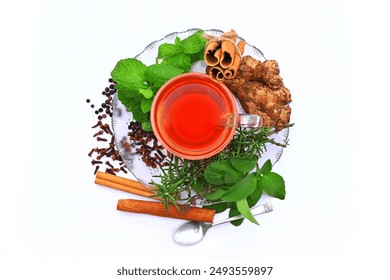 Herbal tea, ayurvedic drink, Indian traditional medicinal beverage, spice tea with ingredients, top view - Powered by Shutterstock