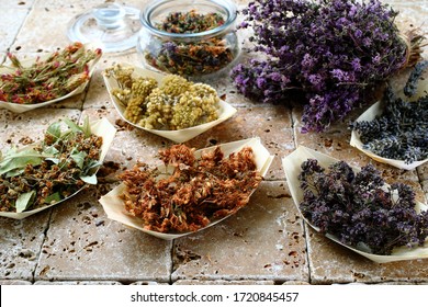  herbal tea  dried flower on rustic stone table
