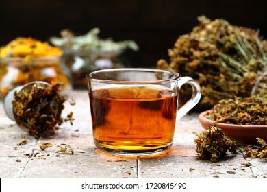 Herbal Tea In Glass On Stone Table Background